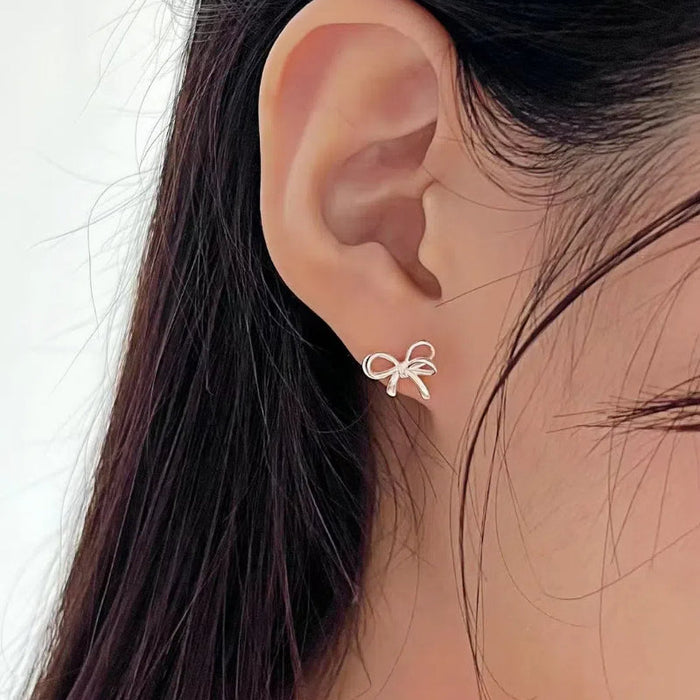 925 Sterling Silver Bowknot Hollow Stud Earrings