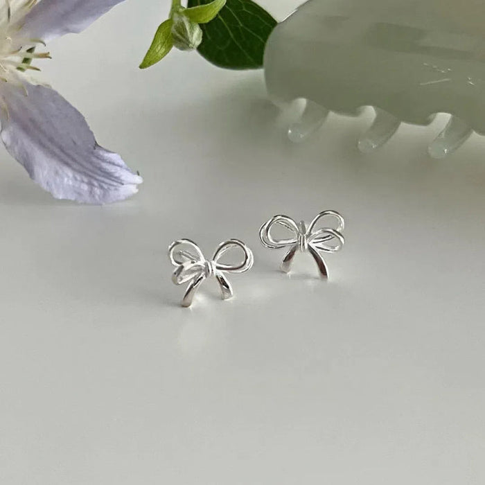 925 Sterling Silver Bowknot Hollow Stud Earrings