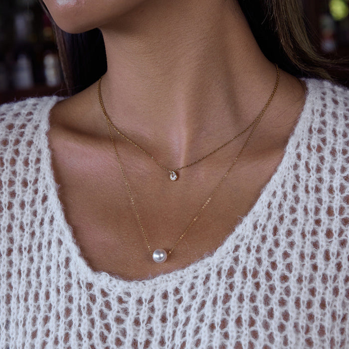 Titanium steel imitation pearl necklace