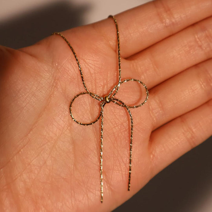 Titanium steel chain bow necklace