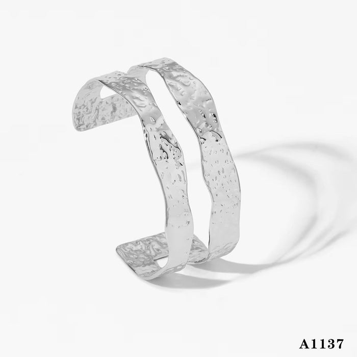 Stainless steel wide-sided opening hollow flower bracelet