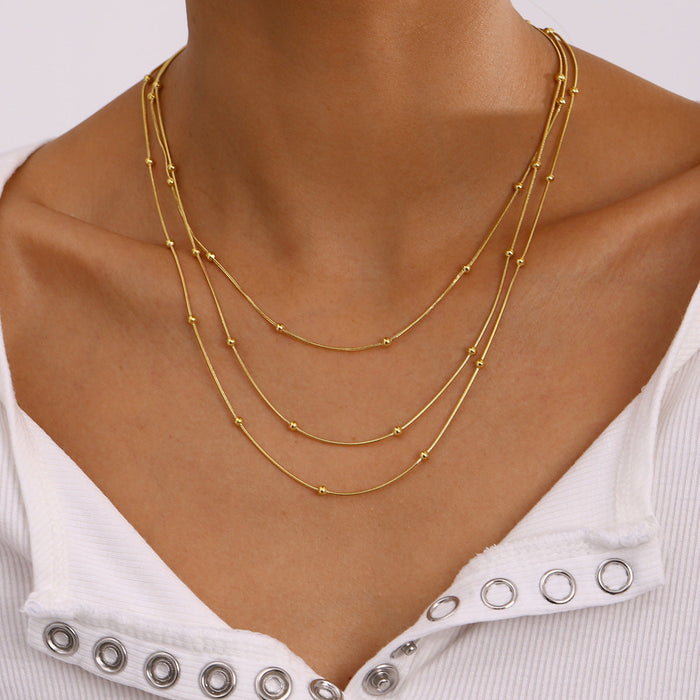 Stainless steel multi-layer gold bead necklace