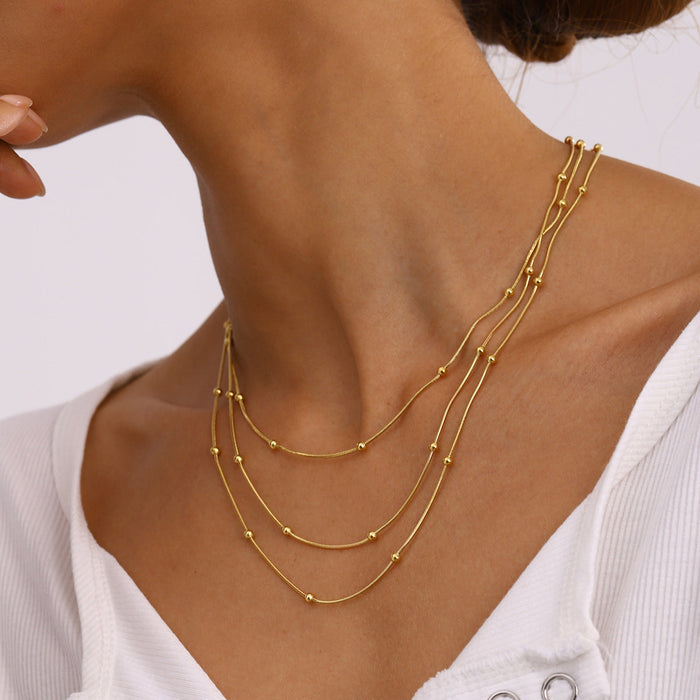 Stainless steel multi-layer gold bead necklace