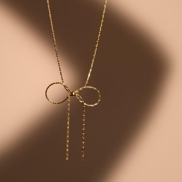 Titanium steel chain bow necklace