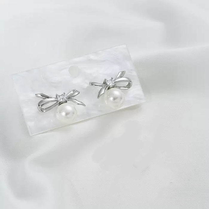 S925 sterling silver chaebol daughter pearl bow earrings