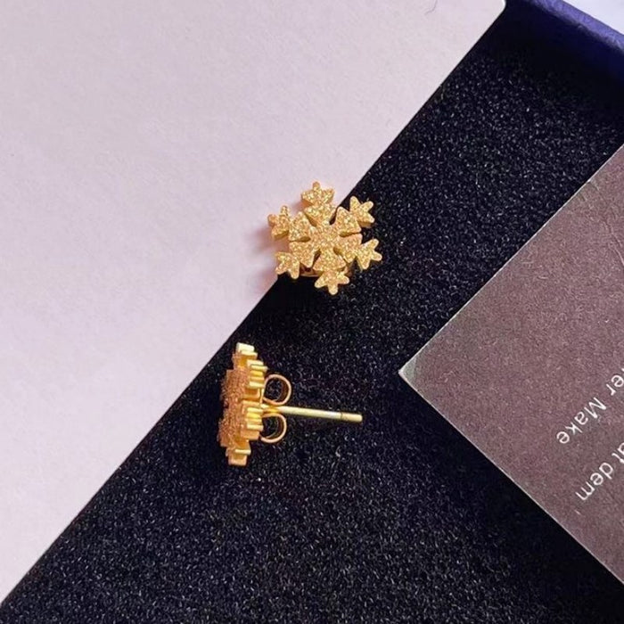 Two snowflake stud earrings