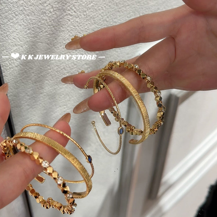 Blue Zircon Vertical Wide-Edge Thin Half-Bangle Bracelet (Gold Version)